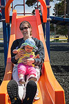 Ellie and mommy on the slide.