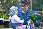 At the Wild Animal Park, she wasn't too sure about the Lorikeets at first, but Ellie warmed up to them.