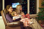 Brooke, Ellie, and Claire watching "How the Grinch Stole Christmas."