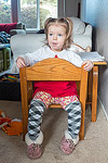 Another interesting way to sit.  She picked out the leg warmers...