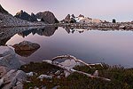 Reflection of Iron Cap Mountain in South Tank Lake at dawn.  Alpine Lakes Wilderness, WA.