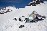 We were getting too hot sitting in the sun, so we decided to see if we could rig up a sun shade.  After a few minutes and some tent parts, ice axes, shovels, and pickets, we had a nice little shelter.