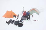 The tracks we were following seemed to be heading the right direction according to our altimeter and map, so we kept following them.  Eventually we saw a tent set up in what we figured was the area we had intended to camp, so we stopped and set up camp.