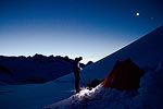 The forecast called for clear weather on Sunday, so we got an early start to avoid the afternoon soft snow.  This is Steve getting ready a little before 4 AM.  The sky was perfectly clear and we had a great view of the Milky Way.  The two bright spots on the right are the moon and Jupiter.