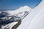 Mt. Baker in the background, and the slope of the summit pyramid in the right foreground.